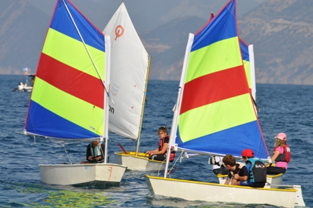 Children sailing Optimist dinghies